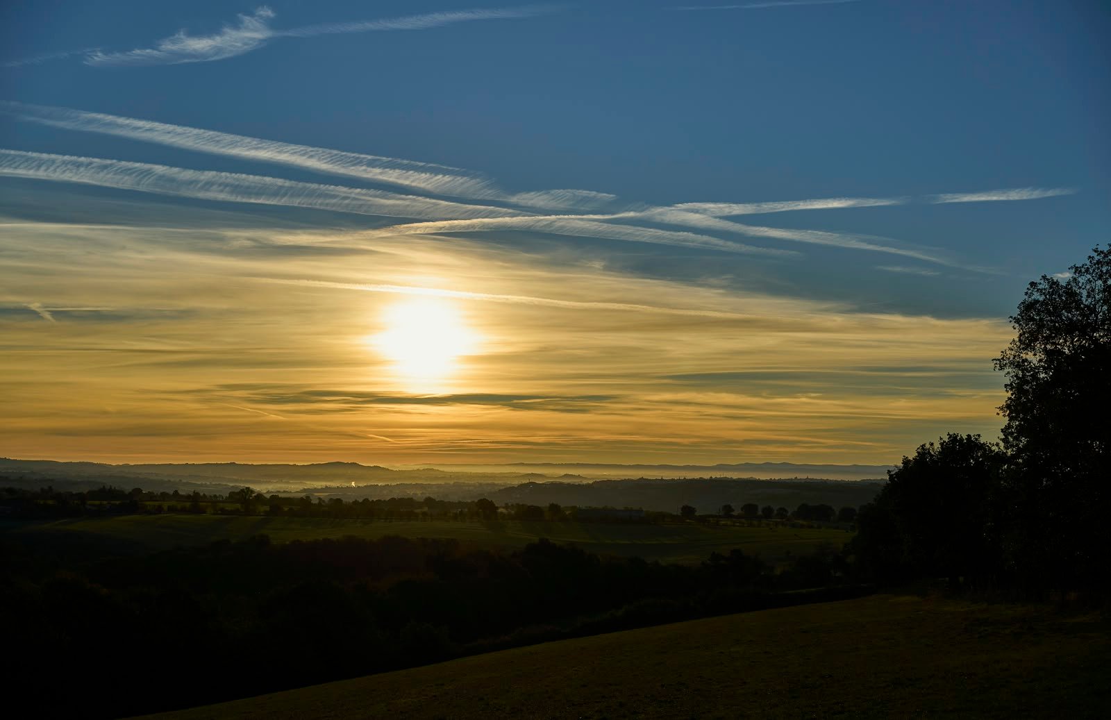 Evening sun low over the hills